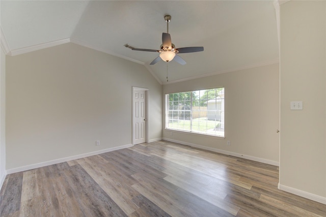 12507 Antean Way Ct, Houston, TX 77065 - spare room featuring vaulted ceiling, ceiling fan, wood finished floors, ornamental molding, and baseboards
