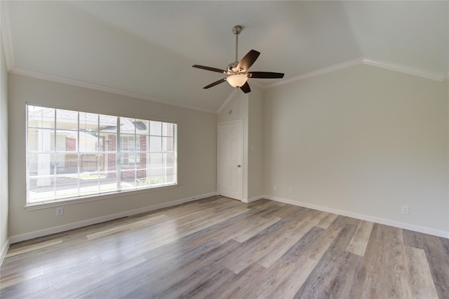 12507 Antean Way Ct, Houston, TX 77065 - spare room with lofted ceiling, a ceiling fan, wood finished floors, crown molding, and baseboards