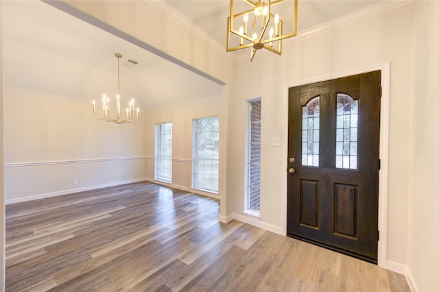12507 Antean Way Ct, Houston, TX 77065 - foyer entrance featuring a chandelier, plenty of natural light, wood finished floors, crown molding, and baseboards