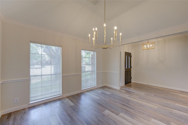 12507 Antean Way Ct, Houston, TX 77065 - empty room with a chandelier, wood finished floors, crown molding, baseboards, and high vaulted ceiling