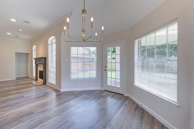 12507 Antean Way Ct, Houston, TX 77065 - unfurnished dining area featuring wood finished floors, a chandelier, baseboards, crown molding, and recessed lighting