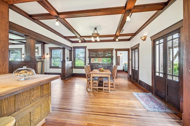 605 Sue St, Houston, TX 77009 - dining room featuring coffered ceiling, baseboards, wood-type flooring, beam ceiling, and french doors