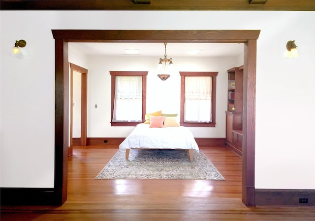 605 Sue St, Houston, TX 77009 - bedroom with light wood finished floors and baseboards