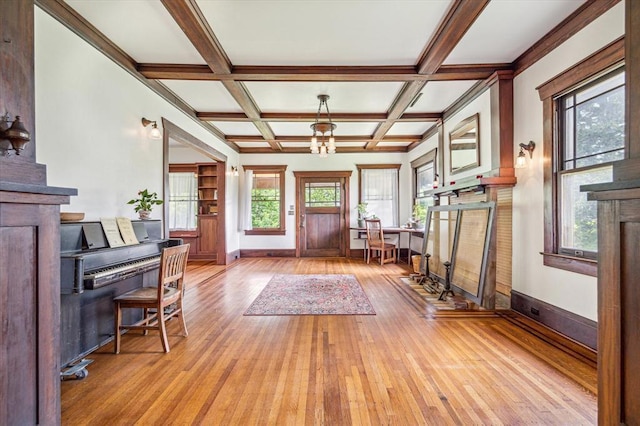 605 Sue St, Houston, TX 77009 - entryway featuring coffered ceiling, hardwood / wood-style floors, baseboards, and beam ceiling