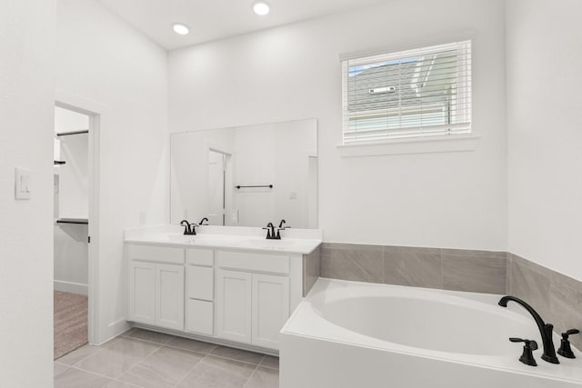 2805 Park Hill Dr, Stafford, TX 77477 - full bath featuring tile patterned flooring, a bath, and double vanity