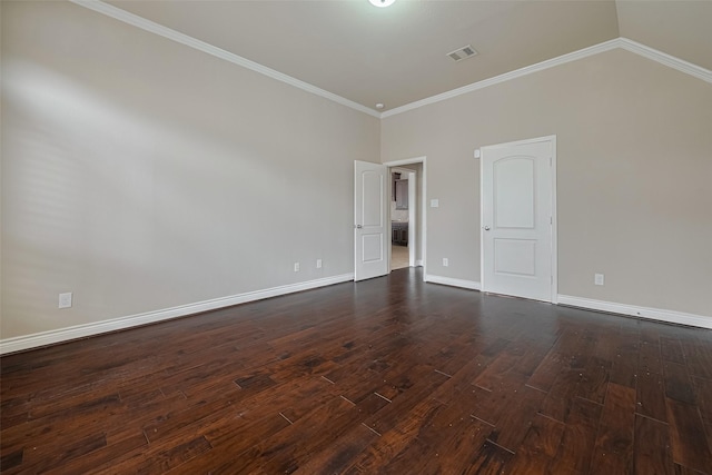 unfurnished room featuring dark wood-style floors, ornamental molding, baseboards, and lofted ceiling