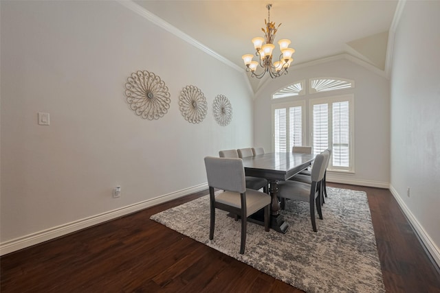 dining space featuring a chandelier, baseboards, dark wood-type flooring, ornamental molding, and lofted ceiling