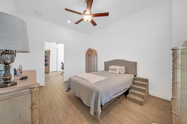 1827 Woodtrace Blvd, Pinehurst, TX 77362 - bedroom featuring light wood finished floors, baseboards, recessed lighting, and a ceiling fan