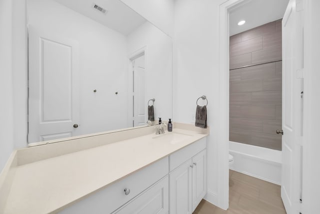 1827 Woodtrace Blvd, Pinehurst, TX 77362 - full bath with toilet, vanity, recessed lighting, and bathtub / shower combination