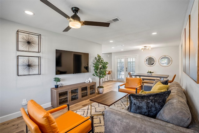 3814 Seabrook St, Houston, TX 77021 - living area with wood finished floors, a ceiling fan, recessed lighting, and baseboards