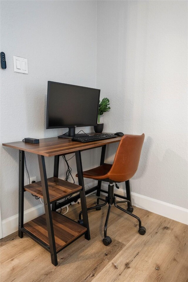 3814 Seabrook St, Houston, TX 77021 - office area with baseboards and wood finished floors