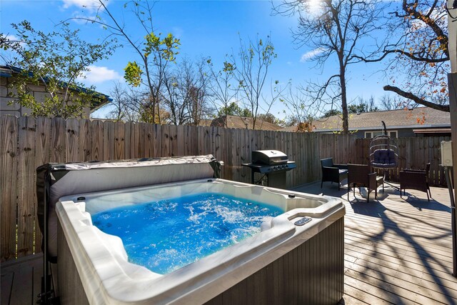 3814 Seabrook St, Houston, TX 77021 - view of pool featuring a hot tub, a grill, a fenced backyard, and a wooden deck
