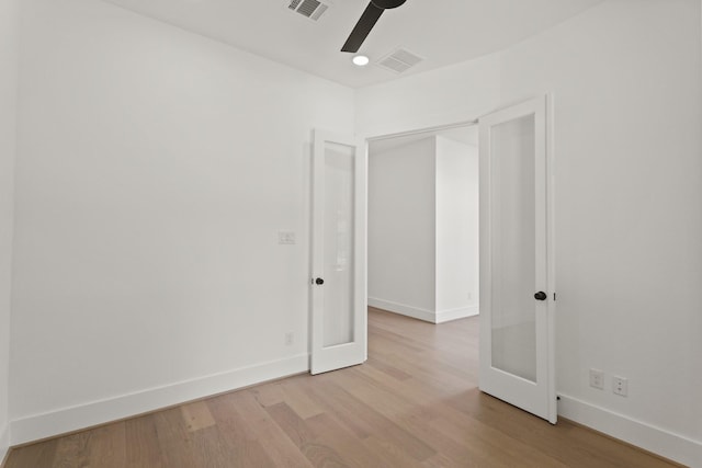 1827 Chantilly Ln, Houston, TX 77018 - unfurnished bedroom with wood finished floors, baseboards, and ceiling fan