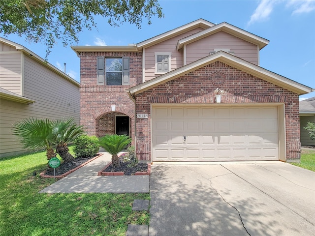 26118 Flinton Dr, Richmond, TX 77406 - traditional-style house featuring brick siding, concrete driveway, a garage, and a front lawn