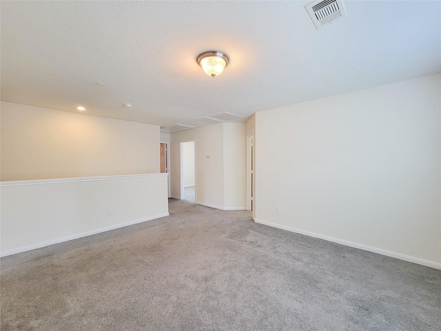 26118 Flinton Dr, Richmond, TX 77406 - unfurnished room with attic access, carpet floors, and baseboards