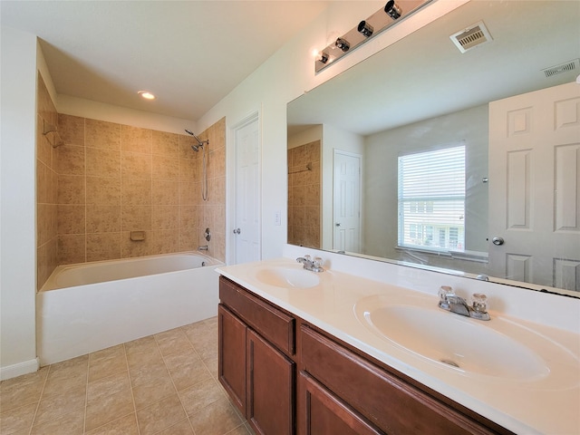 26118 Flinton Dr, Richmond, TX 77406 - full bathroom featuring shower / bathtub combination, double vanity, recessed lighting, and tile patterned flooring
