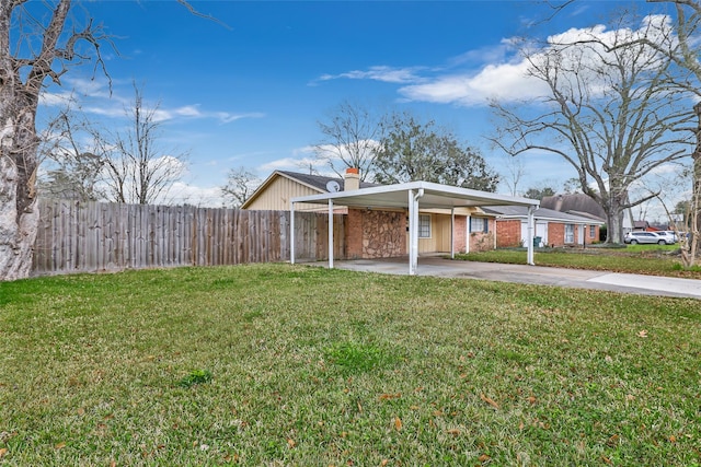 7730 Wickersham Pl, Beaumont, TX 77706 - view of front of home featuring driveway, a chimney, and brick siding