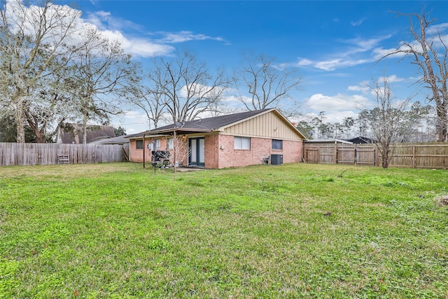 7730 Wickersham Pl, Beaumont, TX 77706 - back of house with brick siding and board and batten siding