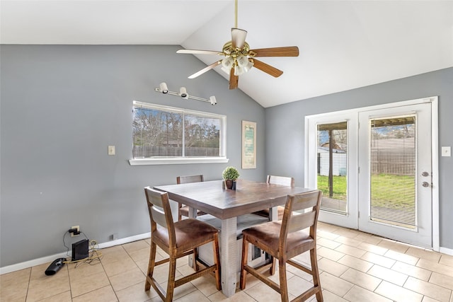 7730 Wickersham Pl, Beaumont, TX 77706 - dining area with lofted ceiling, light tile patterned floors, a ceiling fan, and baseboards