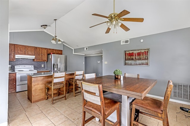 7730 Wickersham Pl, Beaumont, TX 77706 - dining space with light tile patterned flooring, a ceiling fan, and high vaulted ceiling