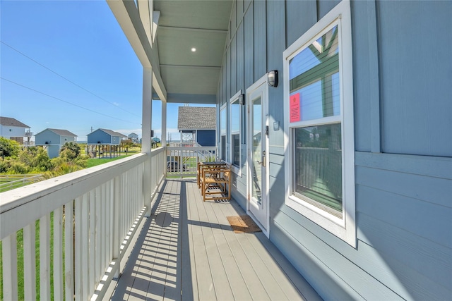 1079 Cedar Ln, Gilchrist, TX 77617 - balcony featuring a residential view