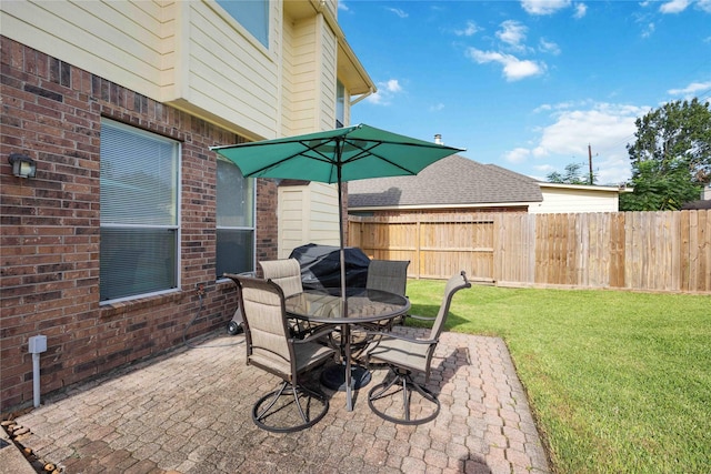 17906 Camden Oaks Ln, Richmond, TX 77407 - view of patio / terrace featuring outdoor dining area and grilling area