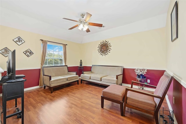 17906 Camden Oaks Ln, Richmond, TX 77407 - living area featuring ceiling fan, wood finished floors, and baseboards