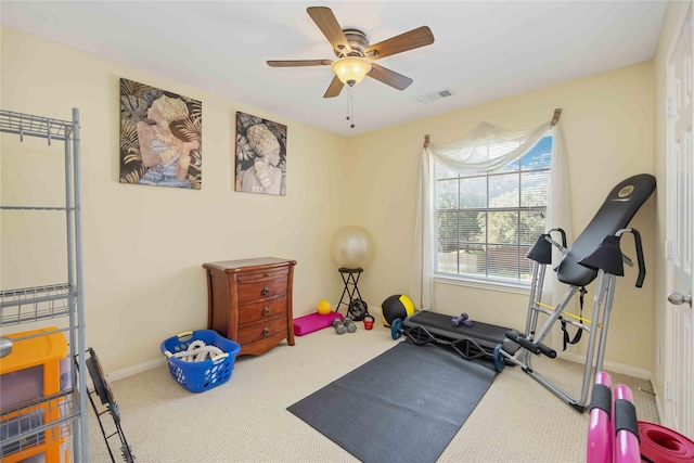 17906 Camden Oaks Ln, Richmond, TX 77407 - workout area featuring carpet floors, ceiling fan, and baseboards