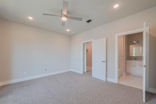 7207 Force St, Houston, TX 77020 - unfurnished bedroom with baseboards, recessed lighting, ensuite bath, light colored carpet, and a spacious closet