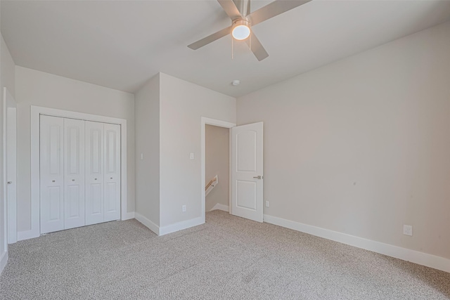 7207 Force St, Houston, TX 77020 - unfurnished bedroom featuring light carpet, baseboards, a ceiling fan, and a closet
