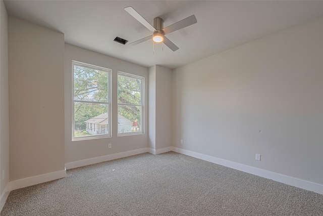 7207 Force St, Houston, TX 77020 - unfurnished room featuring light colored carpet, a ceiling fan, and baseboards