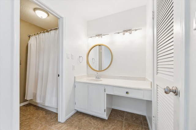 2515 Bering Dr Unit 11, Houston, TX 77057 - full bathroom with vanity and tile patterned floors
