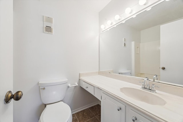 2515 Bering Dr Unit 11, Houston, TX 77057 - bathroom with tile patterned floors and vanity