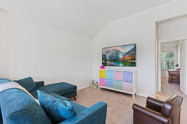 315 Cadela Dr, Montgomery, TX 77316 - living room with light colored carpet, lofted ceiling, and baseboards
