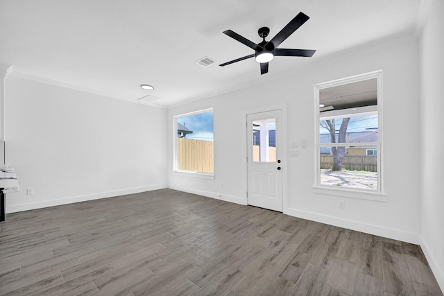 116 York St, South Houston, TX 77587 - unfurnished living room with ornamental molding, wood finished floors, ceiling fan, and baseboards