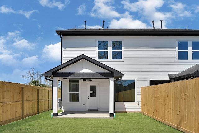 116 York St, South Houston, TX 77587 - back of property featuring a patio area, ceiling fan, and board and batten siding