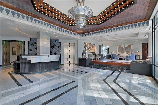reception featuring recessed lighting and crown molding