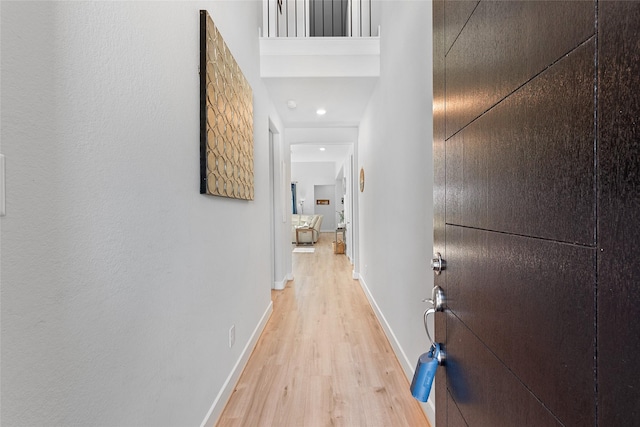 21811 Gibson Desert Dr, Cypress, TX 77433 - hallway with light wood-style flooring, baseboards, and recessed lighting