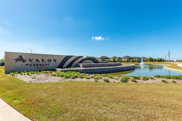 21811 Gibson Desert Dr, Cypress, TX 77433 - community / neighborhood sign featuring a yard and a water view
