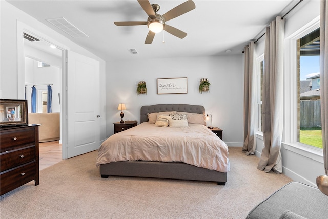 21811 Gibson Desert Dr, Cypress, TX 77433 - bedroom featuring light carpet, a ceiling fan, and baseboards