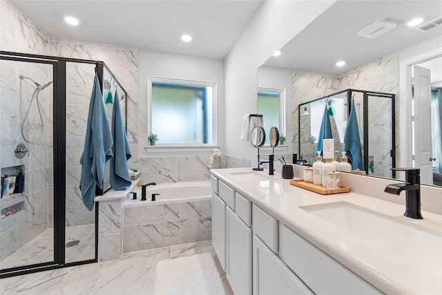 21811 Gibson Desert Dr, Cypress, TX 77433 - full bathroom with marble look tiles, a stall shower, a garden tub, recessed lighting, and double vanity