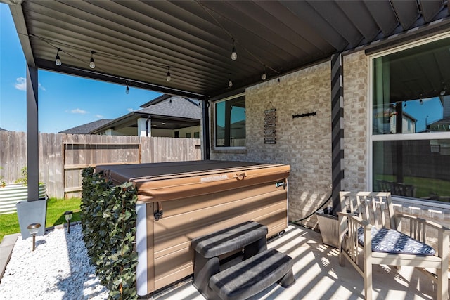 21811 Gibson Desert Dr, Cypress, TX 77433 - view of patio with a hot tub and fence