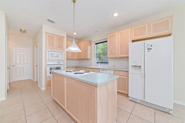 12236 S Shadow Cove Dr, Houston, TX 77082 - kitchen with white appliances, light brown cabinets, light tile patterned floors, a sink, and light countertops