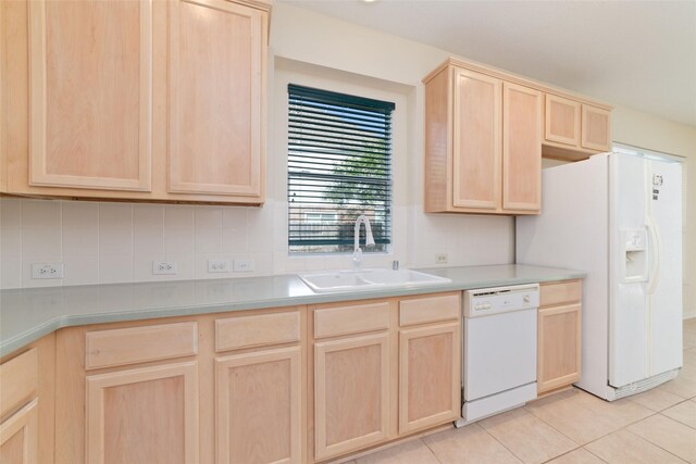 12236 S Shadow Cove Dr, Houston, TX 77082 - kitchen featuring light brown cabinetry, white appliances, a sink, decorative backsplash, and light tile patterned floors