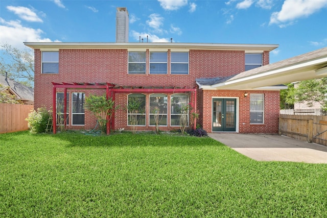 12236 S Shadow Cove Dr, Houston, TX 77082 - rear view of house with french doors, brick siding, and a patio area