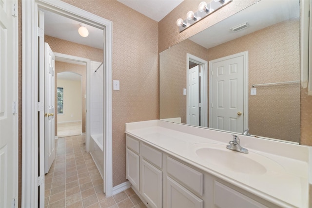 12236 S Shadow Cove Dr, Houston, TX 77082 - bathroom featuring tile patterned flooring, vanity, and tub / shower combination