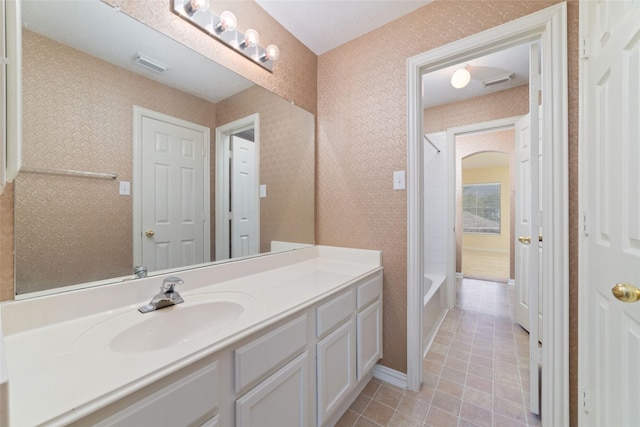 12236 S Shadow Cove Dr, Houston, TX 77082 - bathroom featuring tile patterned flooring, vanity, and shower / tub combination
