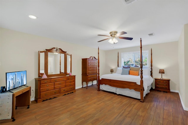 2810 Cottonwood Dr, Katy, TX 77493 - bedroom featuring wood finished floors, baseboards, a ceiling fan, and recessed lighting