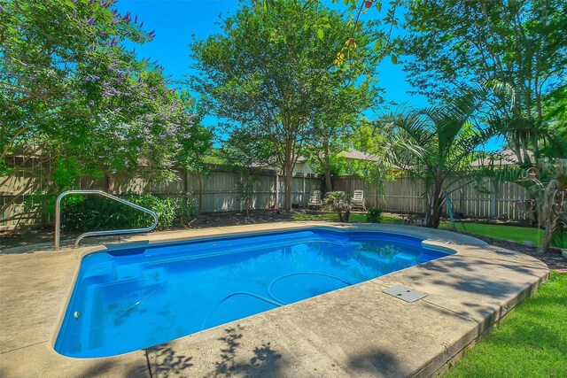 2810 Cottonwood Dr, Katy, TX 77493 - view of swimming pool with a fenced backyard