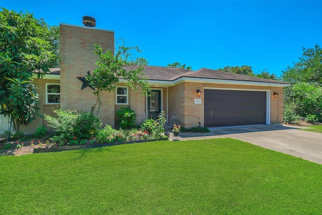 2810 Cottonwood Dr, Katy, TX 77493 - view of front of property featuring a chimney, a front yard, an attached garage, and driveway